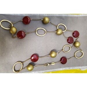 Signed Kiam Family, Red and Gold Tone Beaded Necklace with Bag.